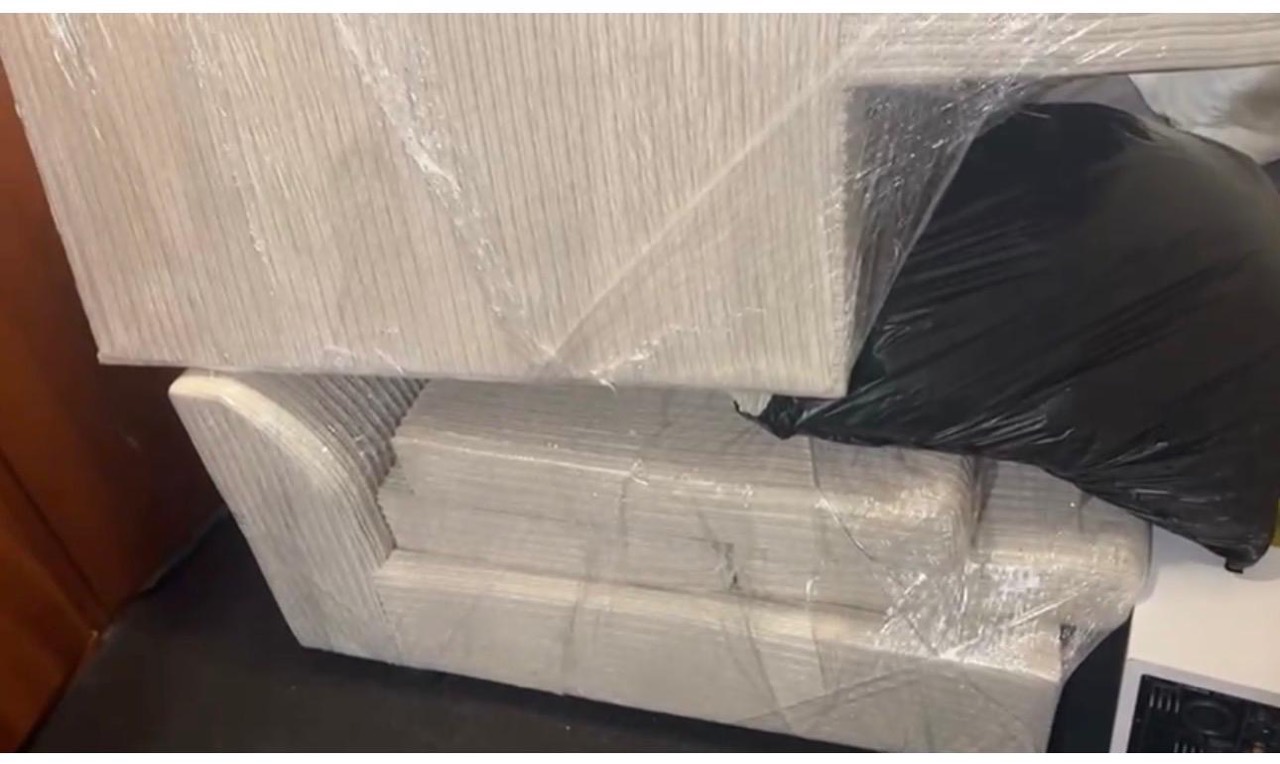 Sofa and furniture fully wrapped in protective film